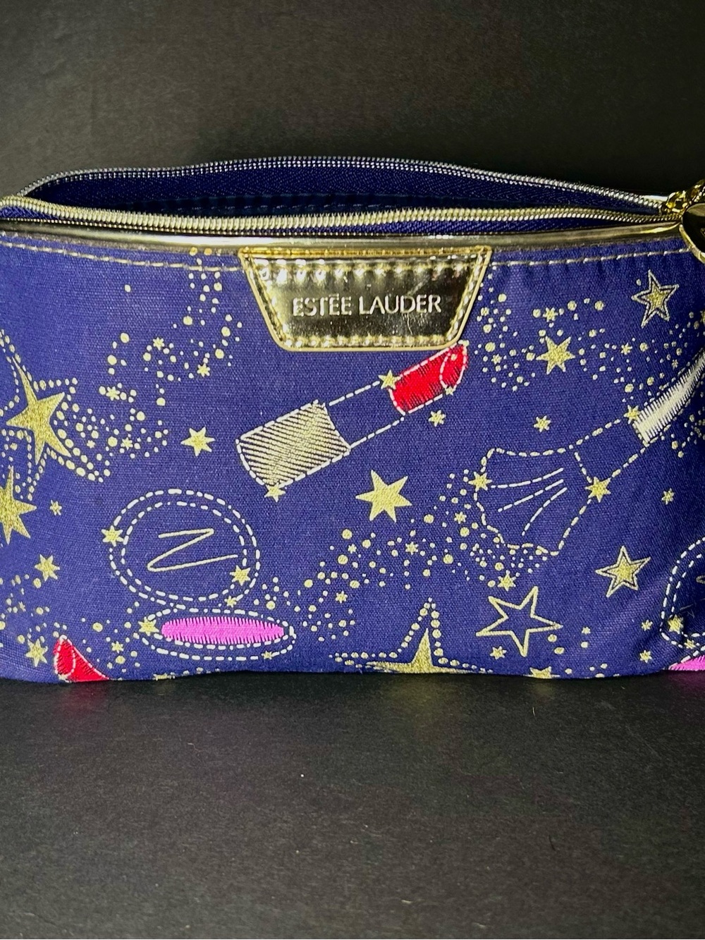 Estee Lauder Navy Cosmetic Pouch with Gold Trim and Red/Pink Accents